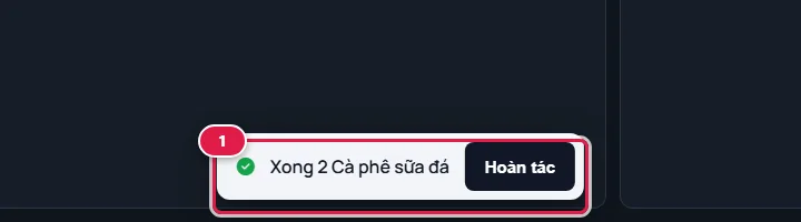 Thanh thông báo trắng ở đáy màn hình: Xong 2 Cà phê sữa đá, nút Hoàn tác, khoanh số 1