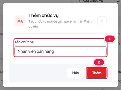 Hộp thoại Thêm chức vụ với ô Tên chức vụ đã gõ Nhân viên bán hàng (số 1) và nút Thêm (số 2)