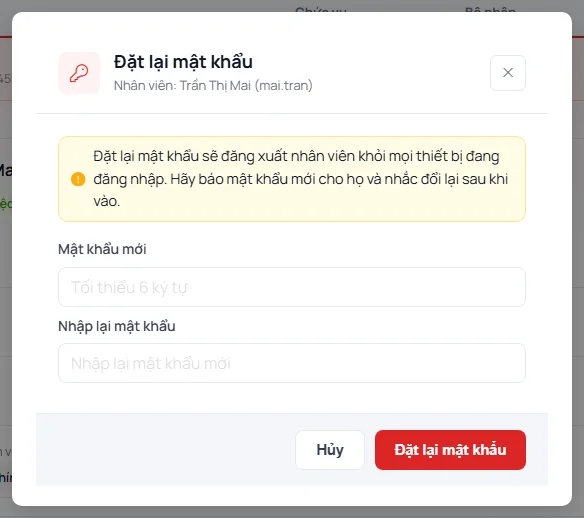 Hộp thoại Đặt lại mật khẩu cho nhân viên Trần Thị Mai, có lời nhắc sẽ đăng xuất nhân viên khỏi mọi thiết bị, hai ô mật khẩu mới và nút Đặt lại mật khẩu